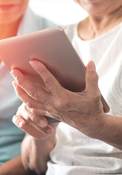 Senior using a tablet
